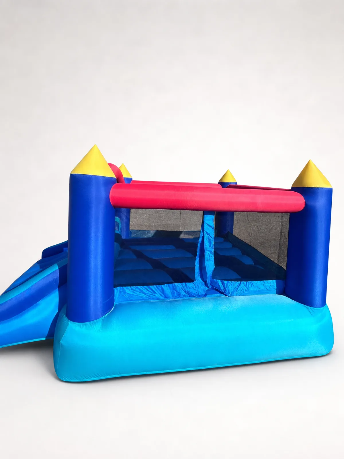 Toddlers bounce house side view showing the mesh walls and jump floor